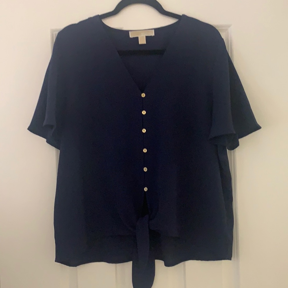 Navy Michael Kors mild crop tie top with gold buttons.